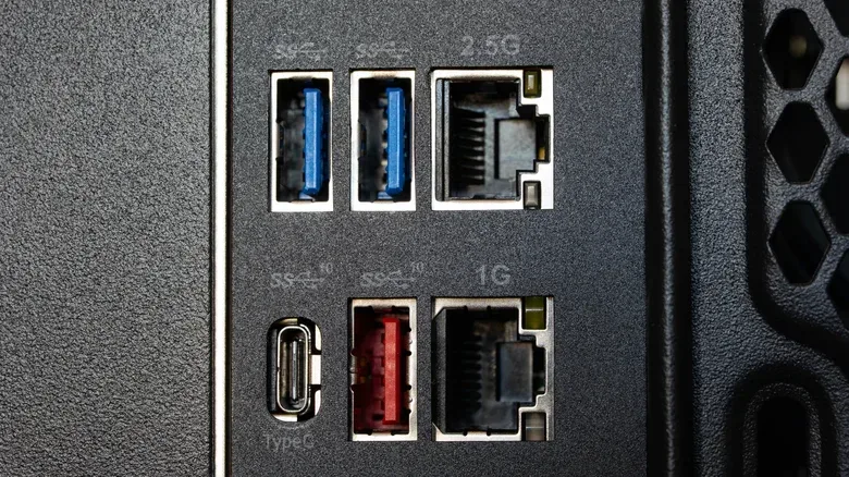 A powered USB hub beside keyboard and mouse cables