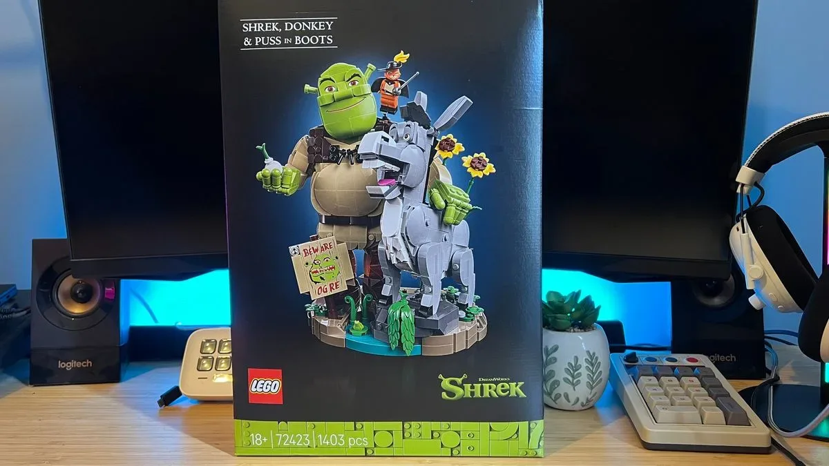 LEGO Shrek and Donkey standing on the swamp display base