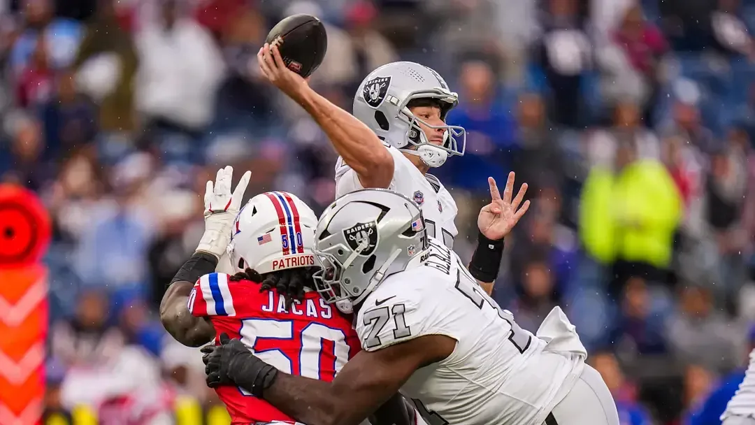 Las Vegas Raiders quarterback Fernando Mendoza throws a pass against the New England Patriots.