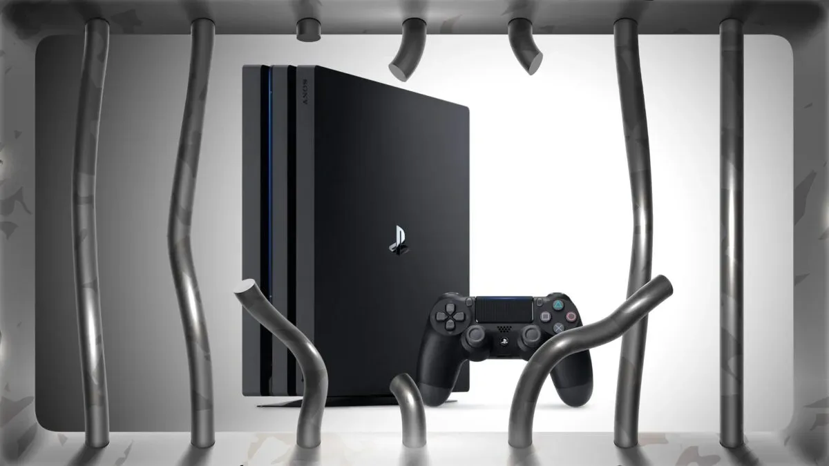 A PlayStation 4 console beside a laptop showing homebrew code