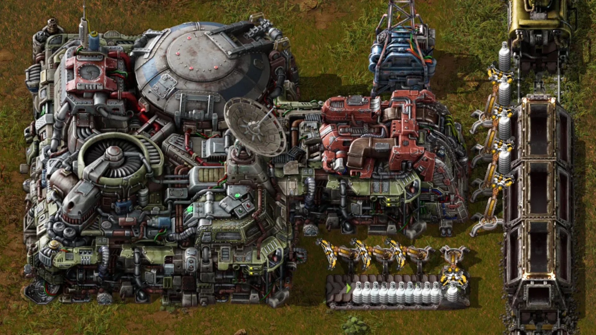 Factorio factory production lines and rail infrastructure