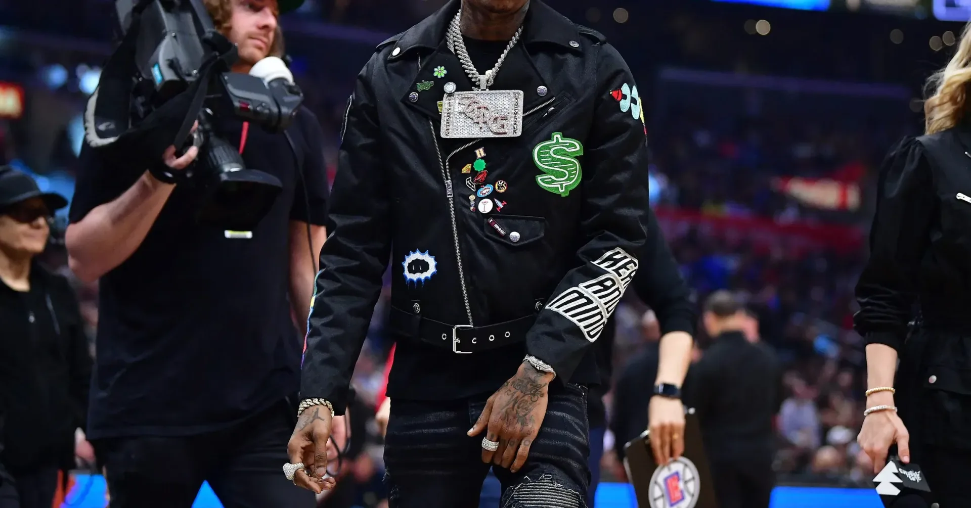 Soulja Boy standing in front of a United States flag in a post promoting a 2028 public-service message