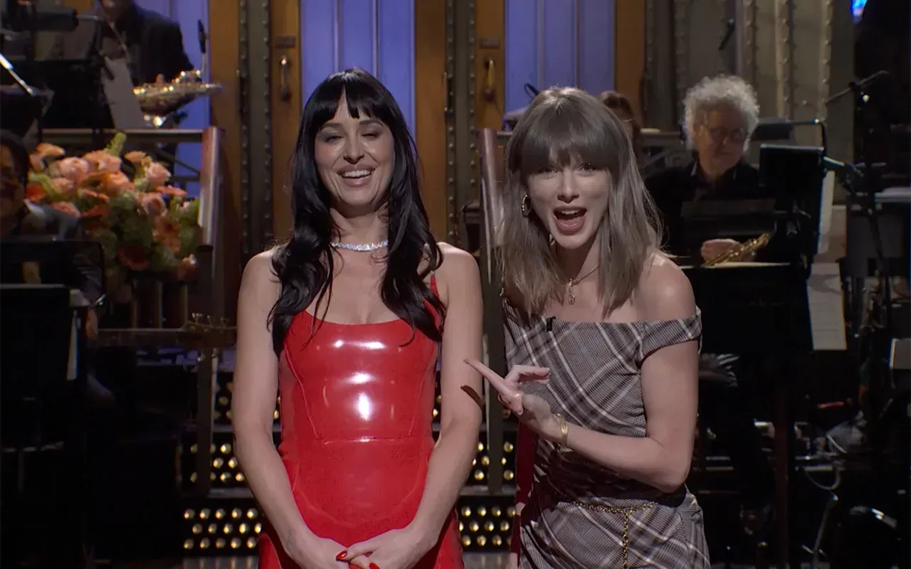Taylor Swift and Dakota Johnson during a Saturday Night Live monologue cameo