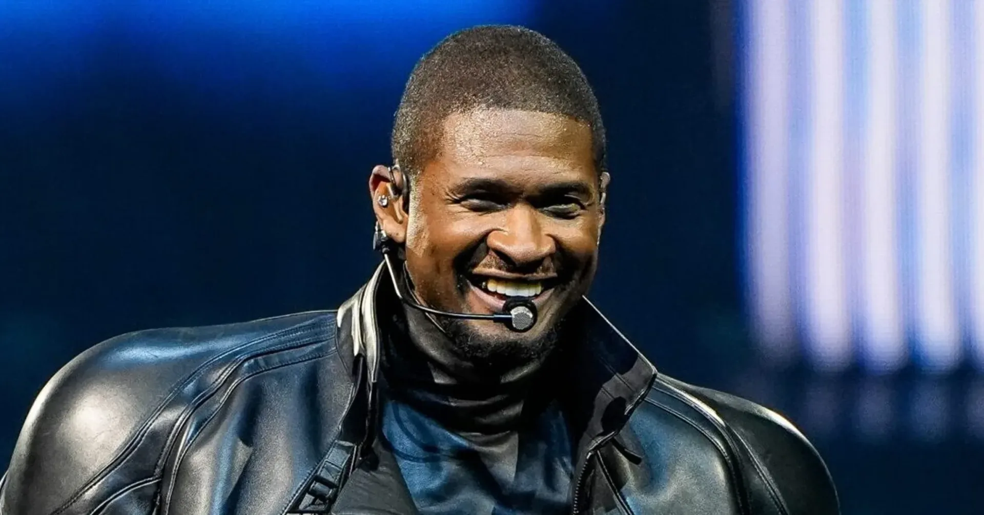 Usher attending a close-up magic performance during his 48th birthday celebration in Manhattan