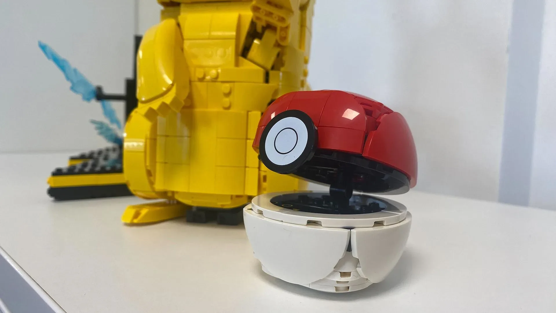 Conceptual LEGO-style Pokémon build displayed on a small habitat base