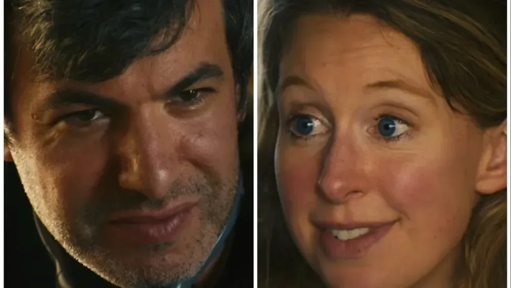 Nathan Fielder and Elizabeth Holmes inspired Halloween costume components including headphones and black turtleneck