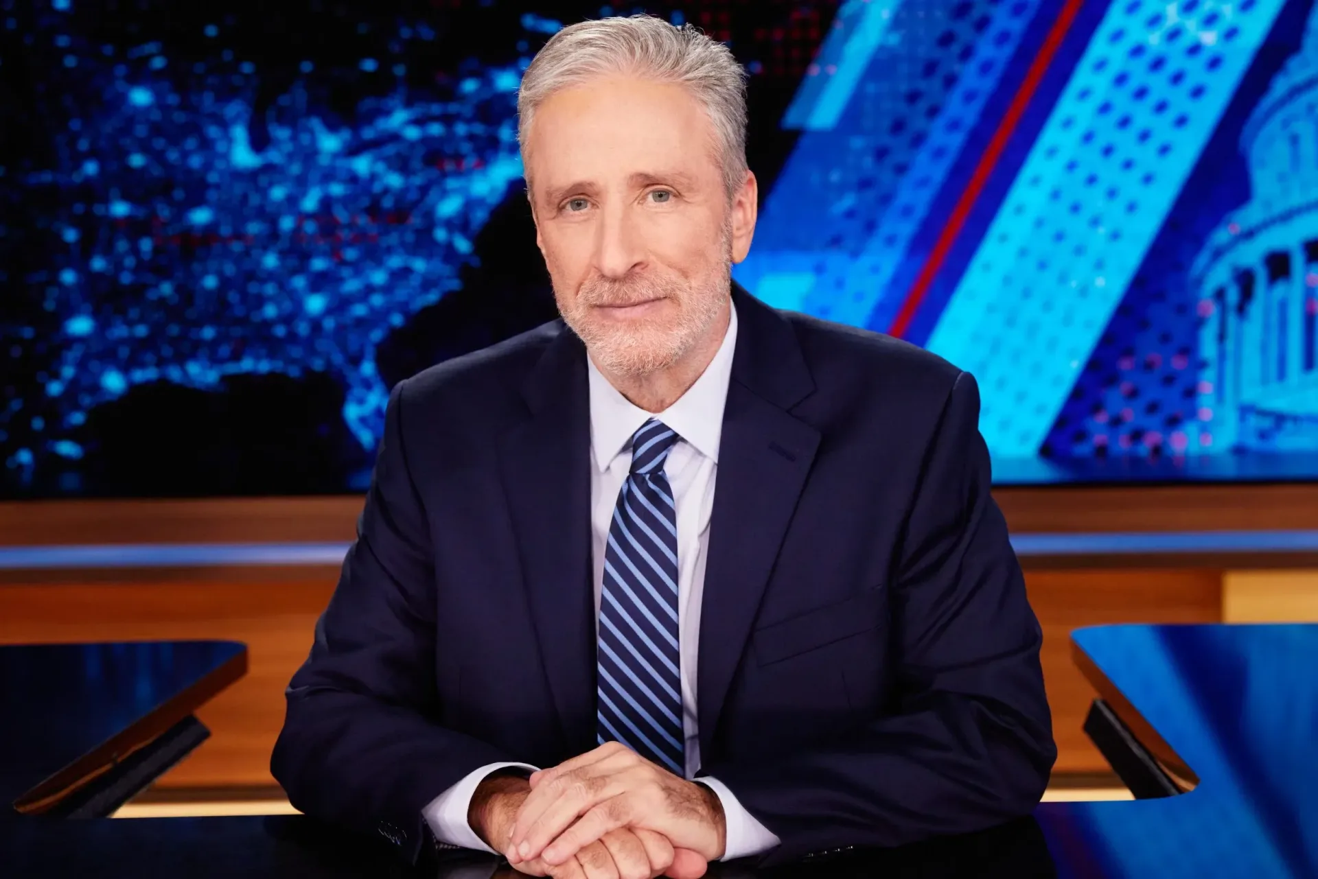 Jon Stewart at the desk on The Daily Show