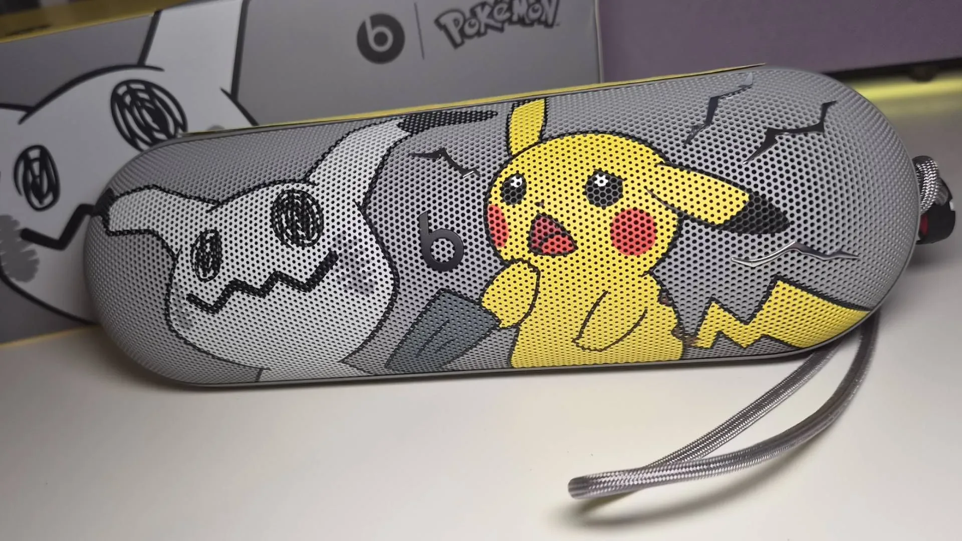 Pokémon Special Edition Beats Pill portable speaker with Pikachu and Mimikyu artwork on its front grille