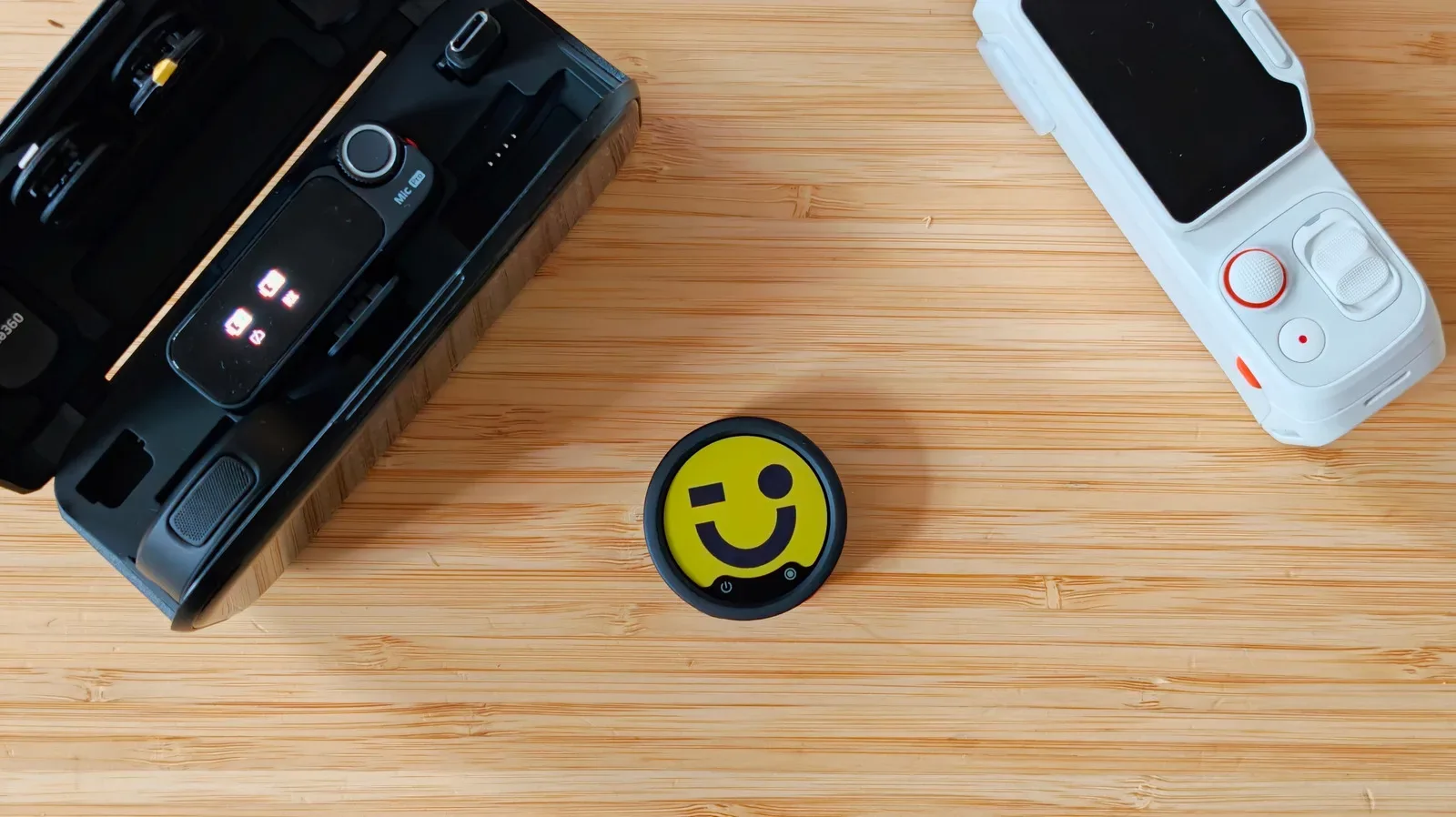 Insta360 Mic wireless microphone with a customizable e-ink display