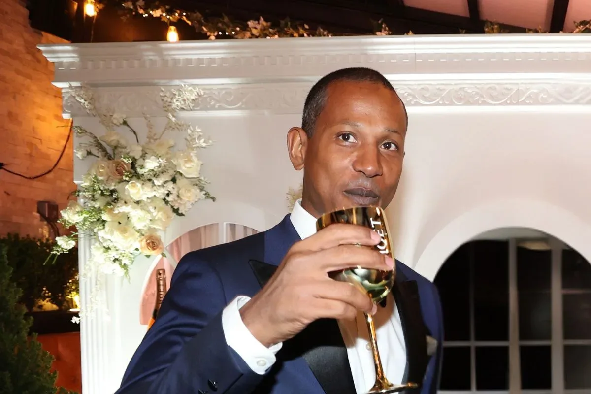 Shyne performing on stage during a live music appearance