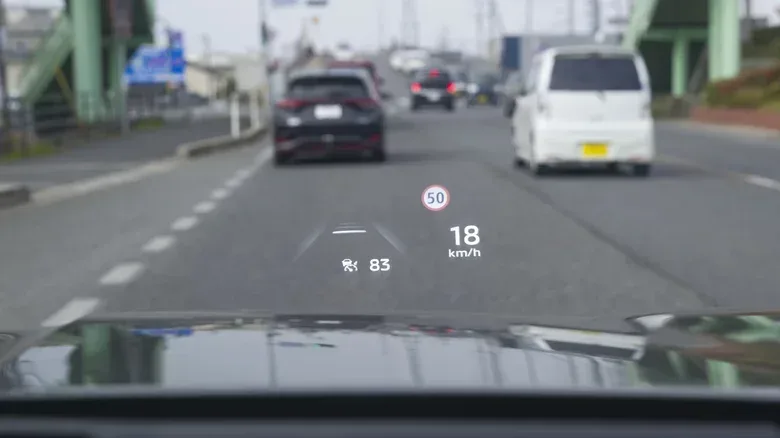 Windshield camera monitoring lane markings for an adaptive cruise control system