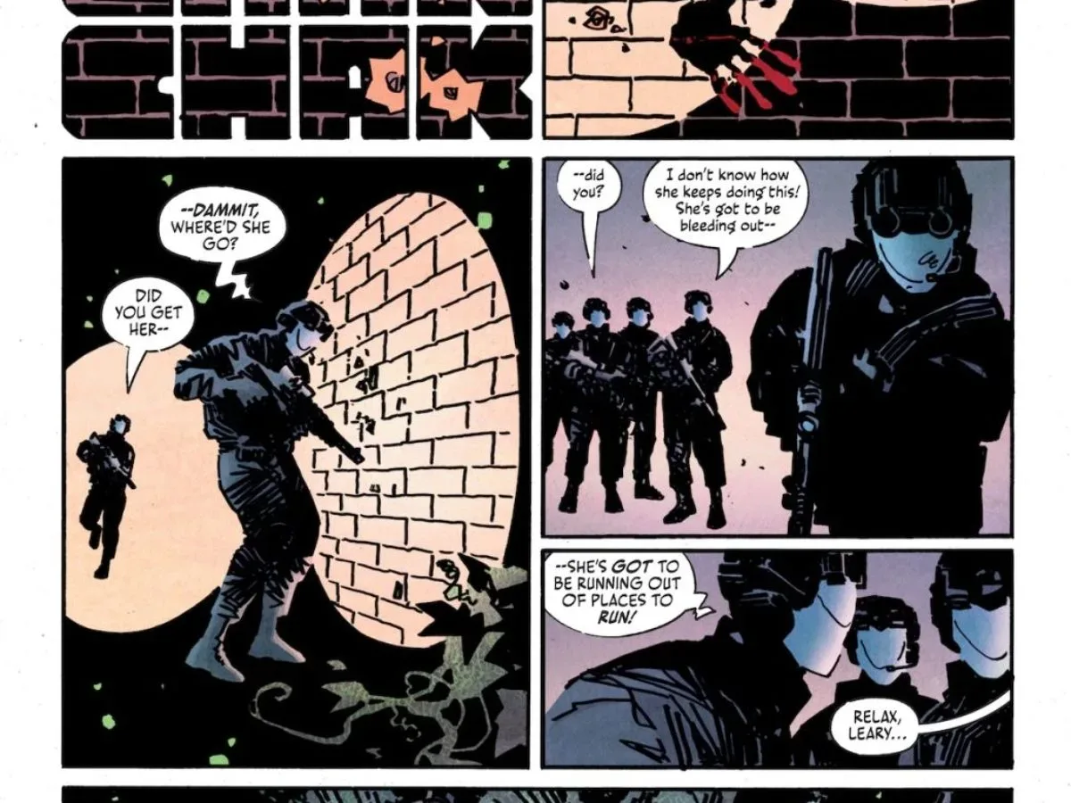 Batwoman moves through the dark corridors of the Cathedral of St. Dumas
