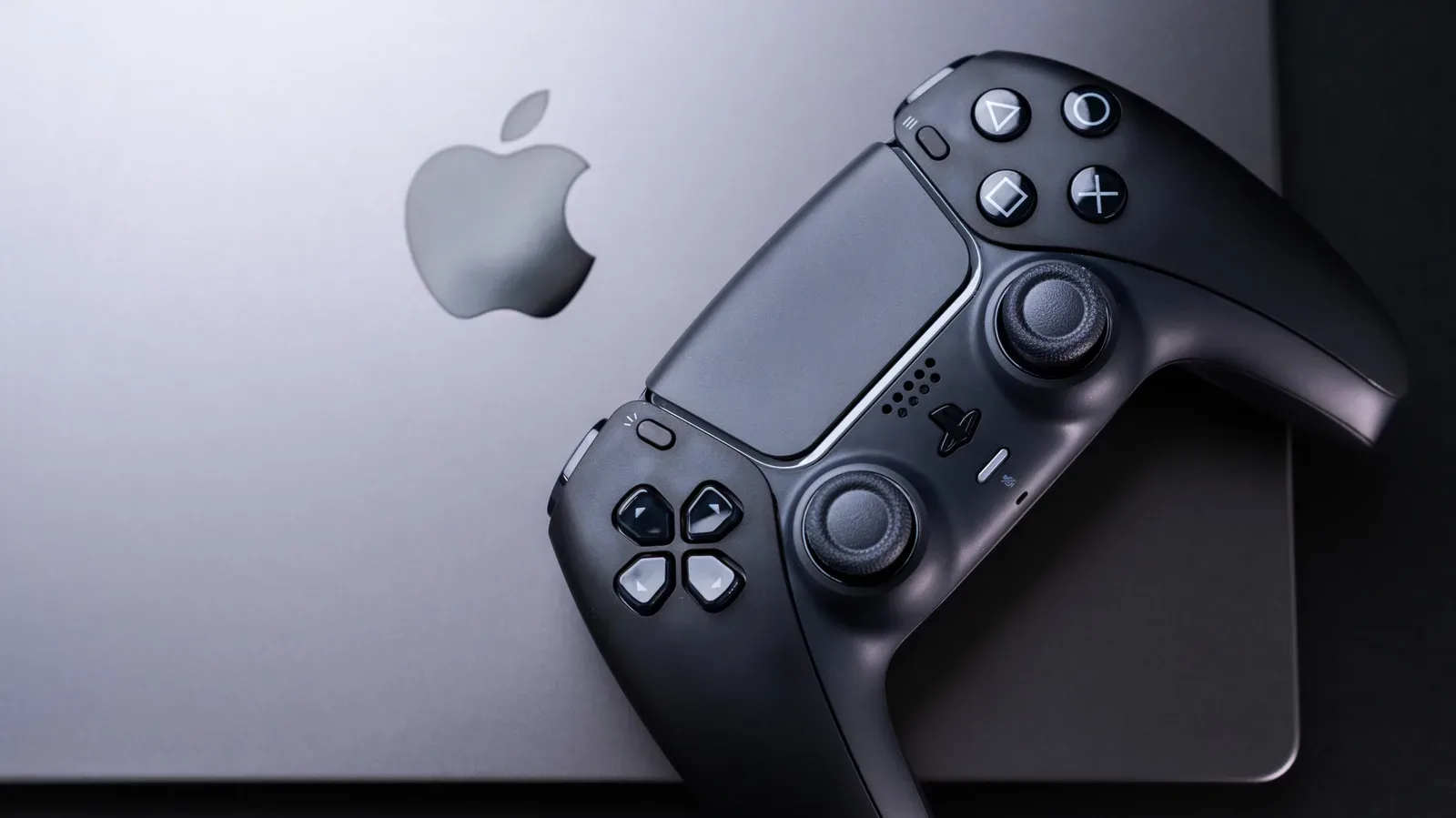 A MacBook Pro displaying a graphically demanding PC game