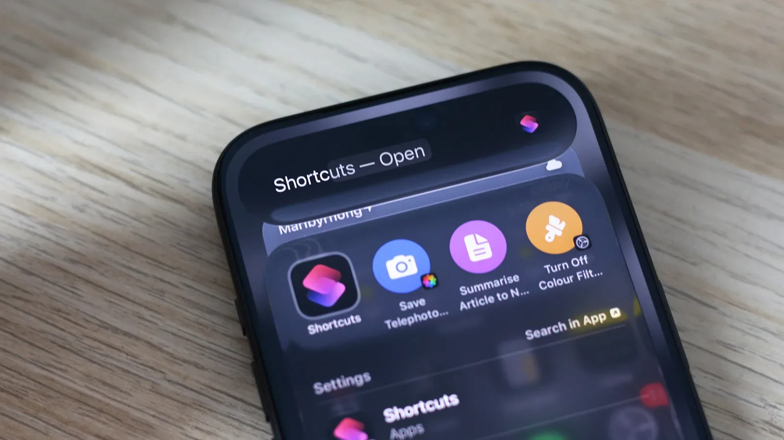 The iPhone Shortcuts app displaying an Apple Intelligence-generated automation workflow