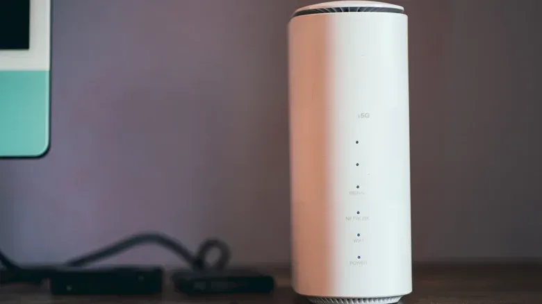 A close-up view of a 5G router on a desk.