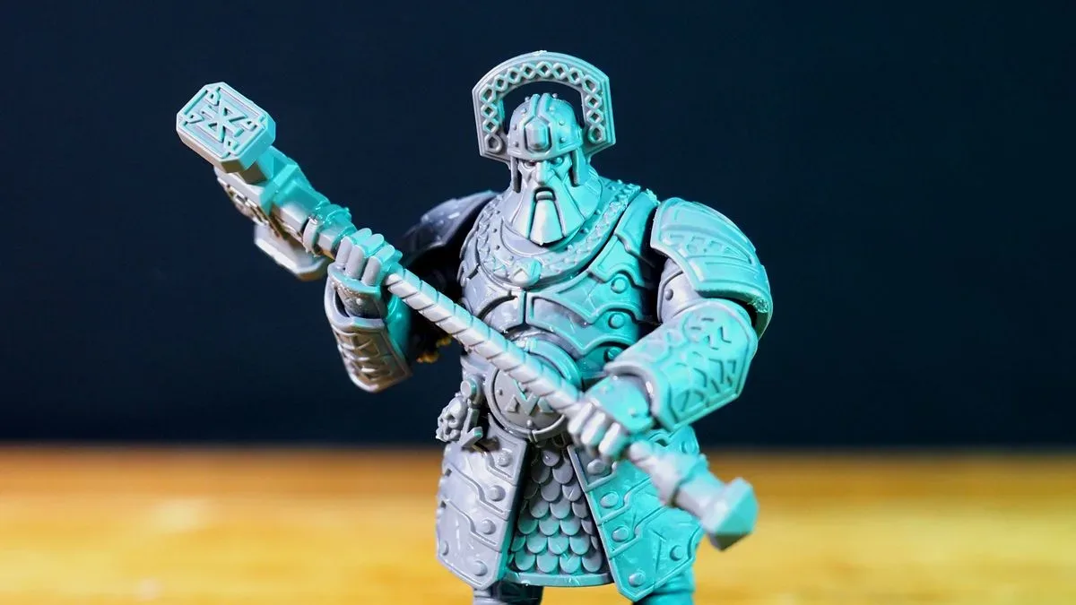 A Gholem wielding a warhammer against a dark background