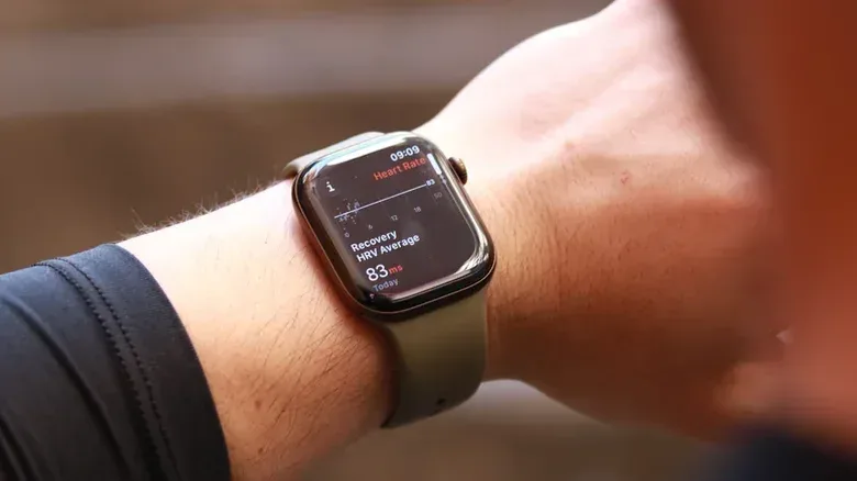Person wearing an Apple Watch Series 12.