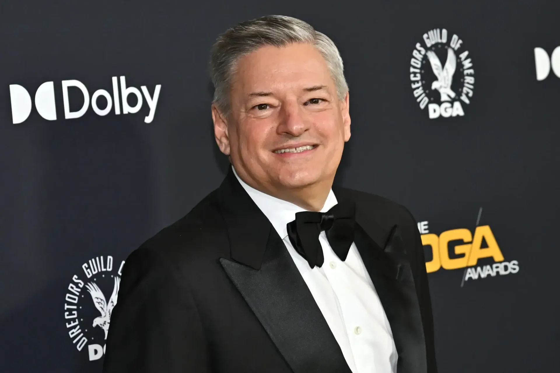 Netflix leadership overhaul illustration featuring Ted Sarandos and Peter Rice