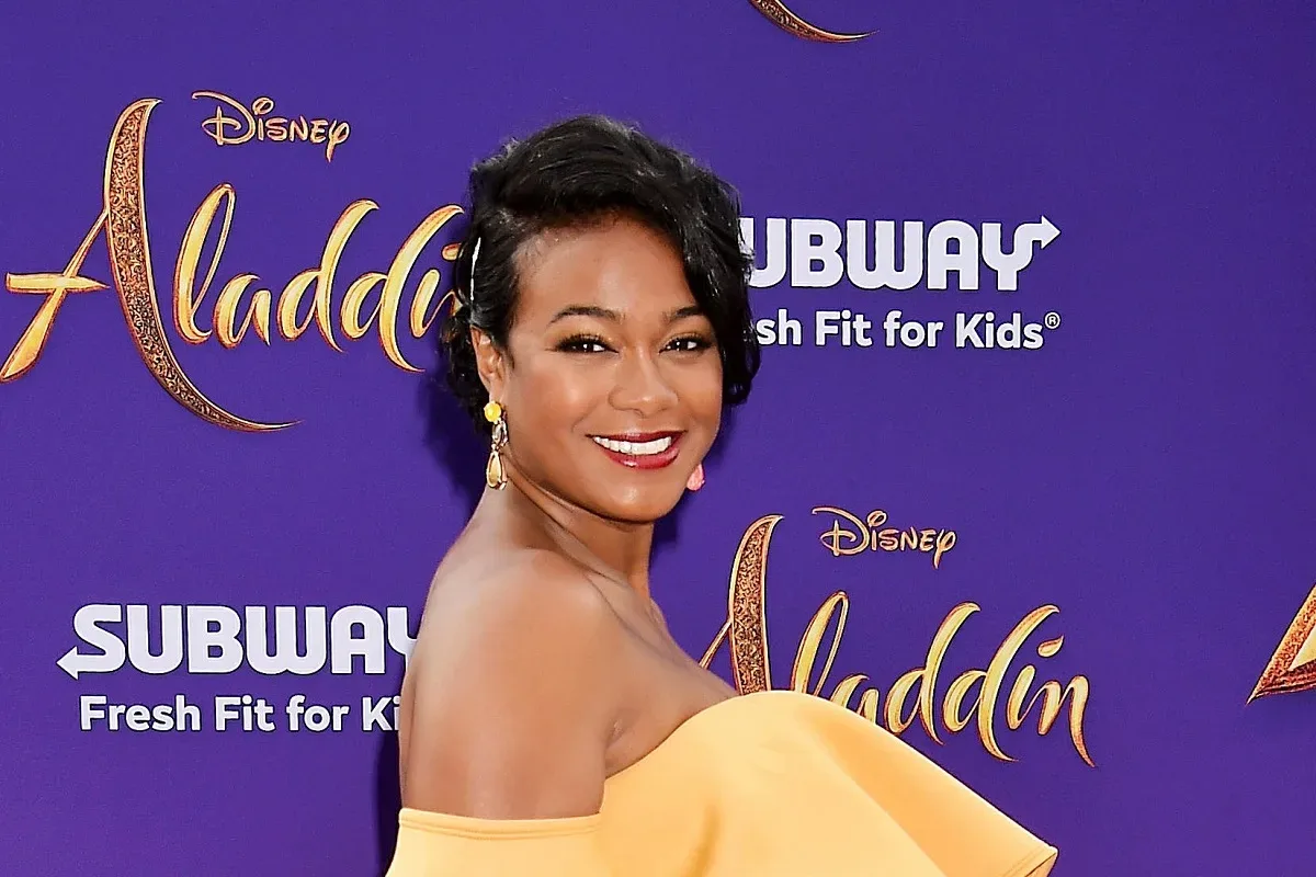 Tatyana Ali and Alfonso Ribeiro embrace during a James Avery tribute on Dancing With the Stars