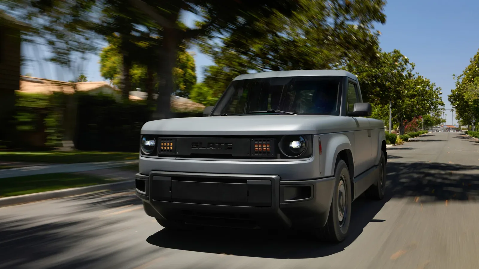 Slate electric truck shown in a minimalist rear-wheel-drive configuration