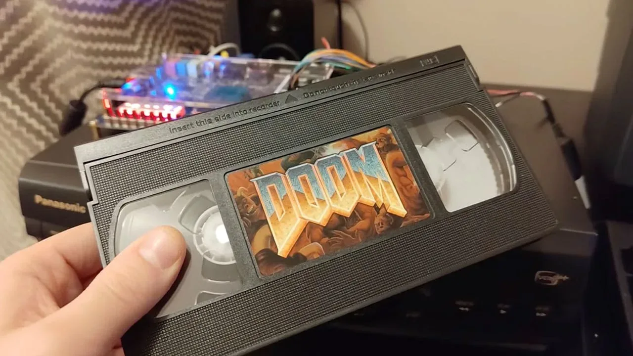 A custom FPGA-based VHS gaming console built for interactive retro game demonstrations