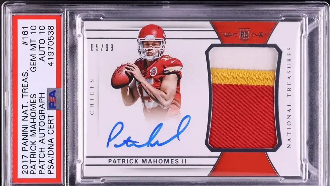 Blue autograph below player photo with patch of jersey on right of card, in a PSA slab and graded a 10 overall.