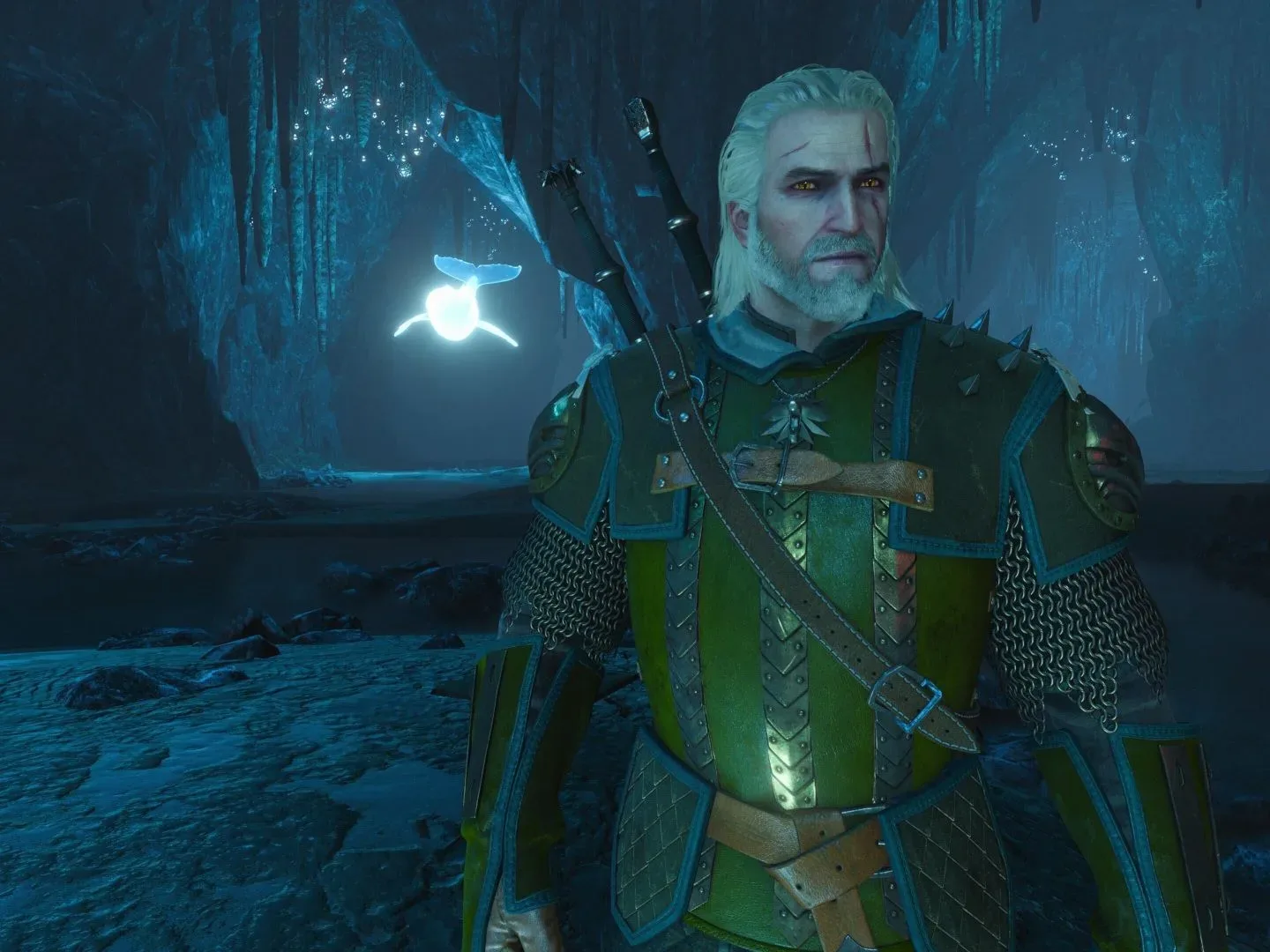 The Witcher 3 screenshot of Geralt in a cave wearing the Griffin armor set