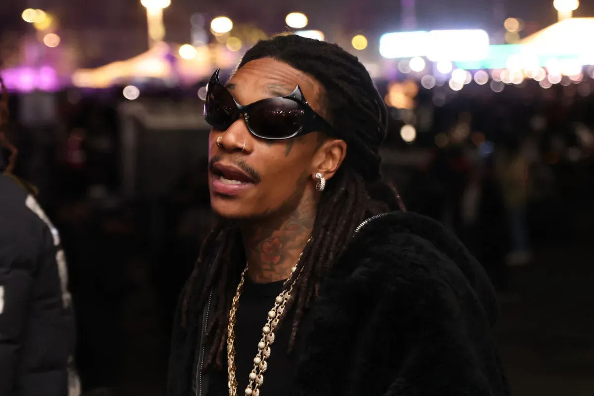 Wiz Khalifa performing onstage during a live music set