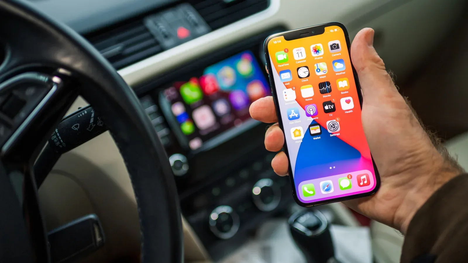 Apple CarPlay dashboard showing a customizable stack of iPhone widgets