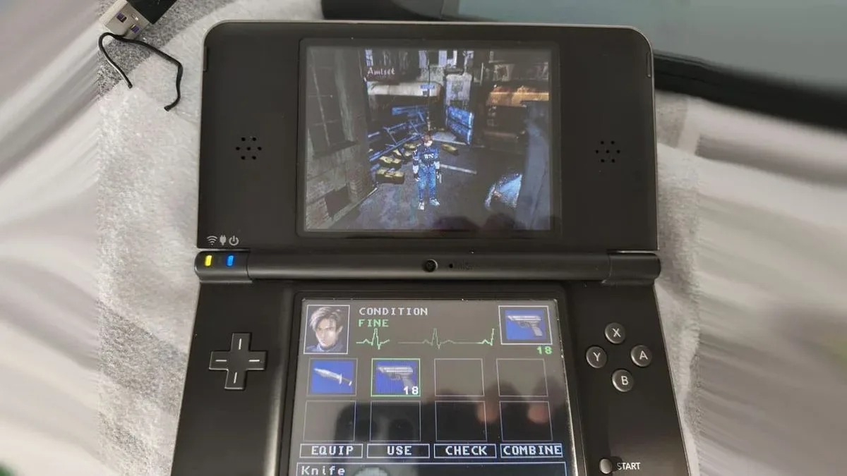Resident Evil 2: Deadly Science homebrew running on a Nintendo DS-style dual-screen layout