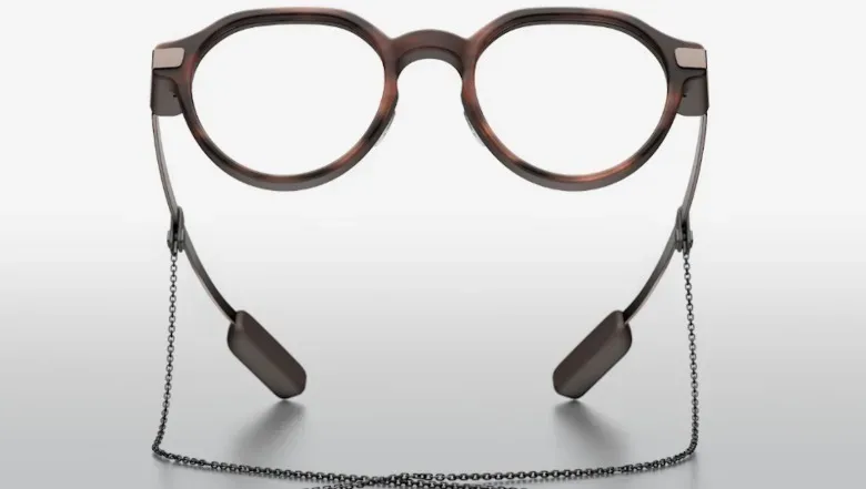 A pair of glasses and chain.