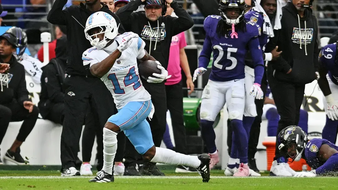 Tennessee Titans rookie wide receiver Carnell Tate running with the football against Baltimore