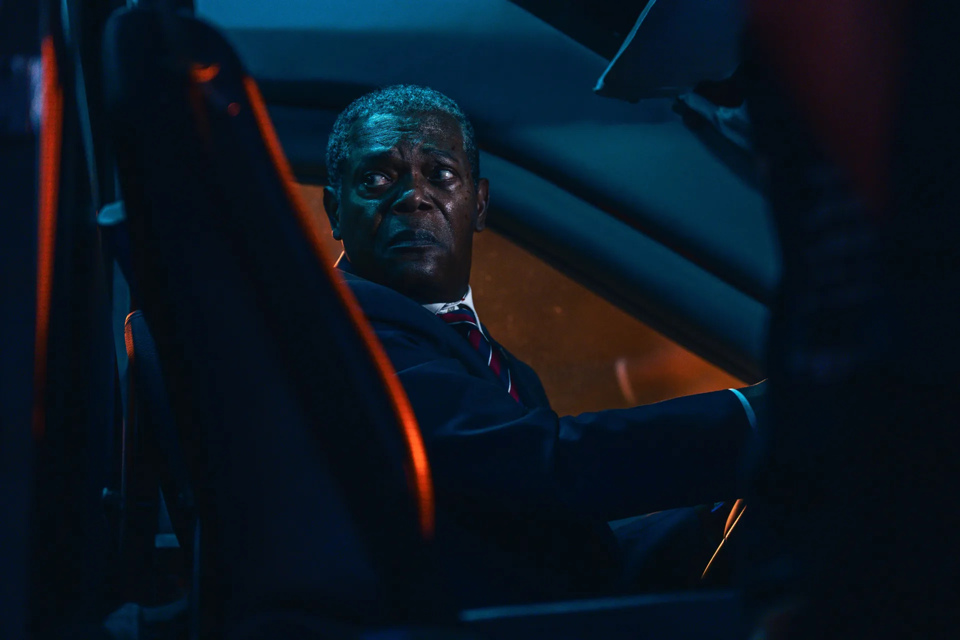 Samuel L. Jackson as President Oscar Palladin driving the armored vehicle in The Beast