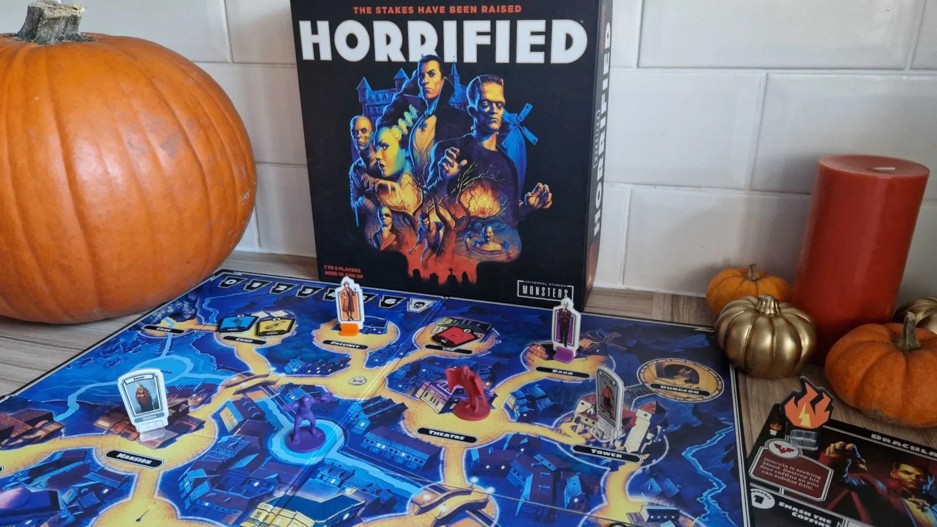 Horrified board game with classic monster objectives and a gothic village setting