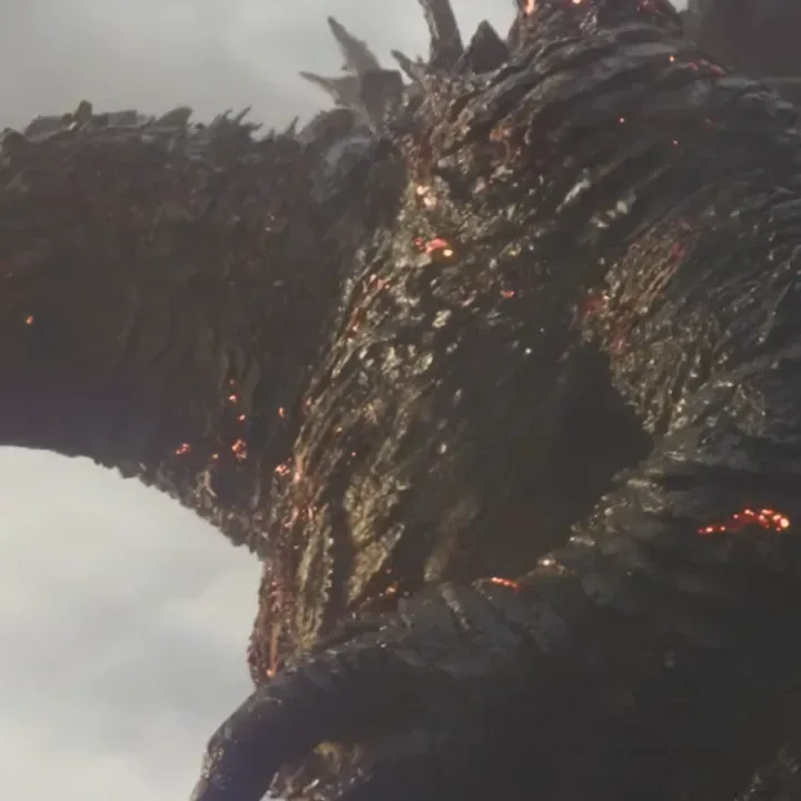 Godzilla rises from the ocean while pursuing a plane in Godzilla Minus Zero