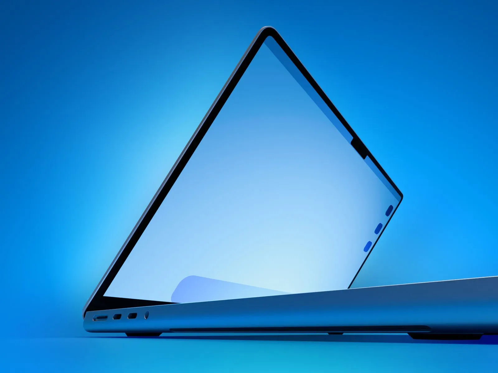MacBook Pro beside a game controller, illustrating touch-screen laptop discussion