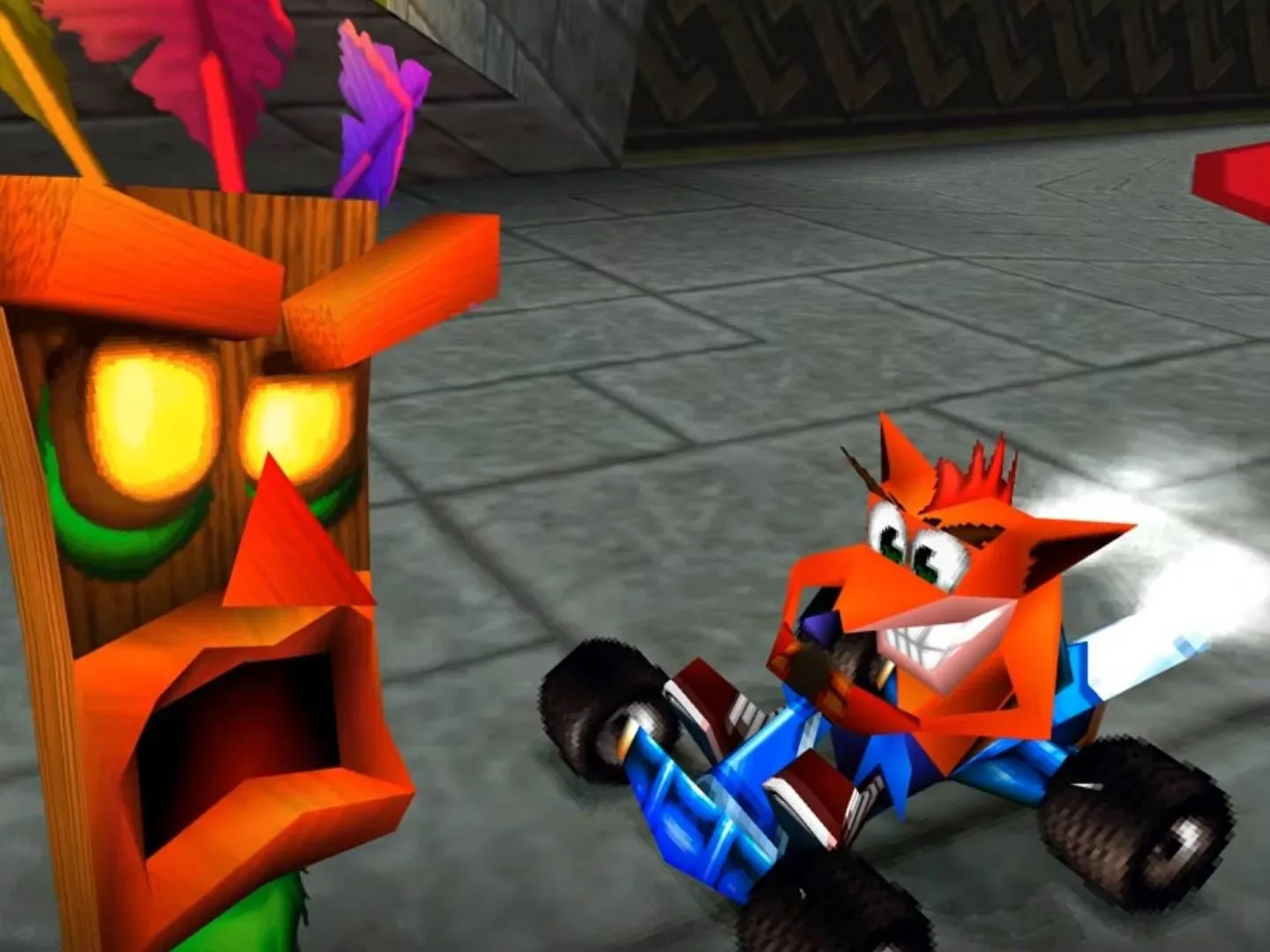 Screenshot of Crash Team Racing Turbocharged decomp for PC with Crash on blue kart and Aku Aku on right.