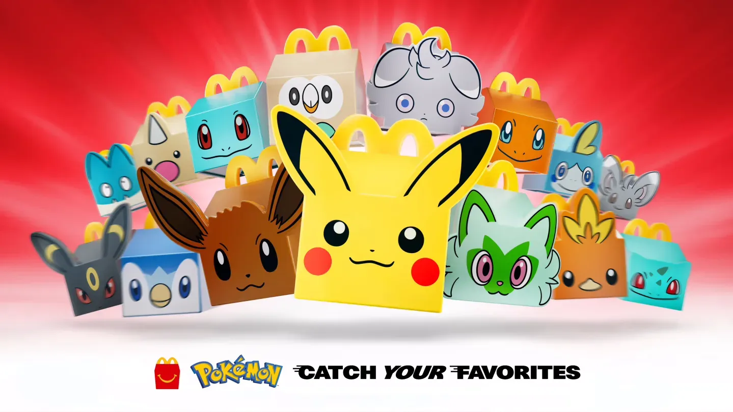 Pokémon-themed McDonald’s Happy Meal promotion featuring miniature box toys and Pokémon TCG cards