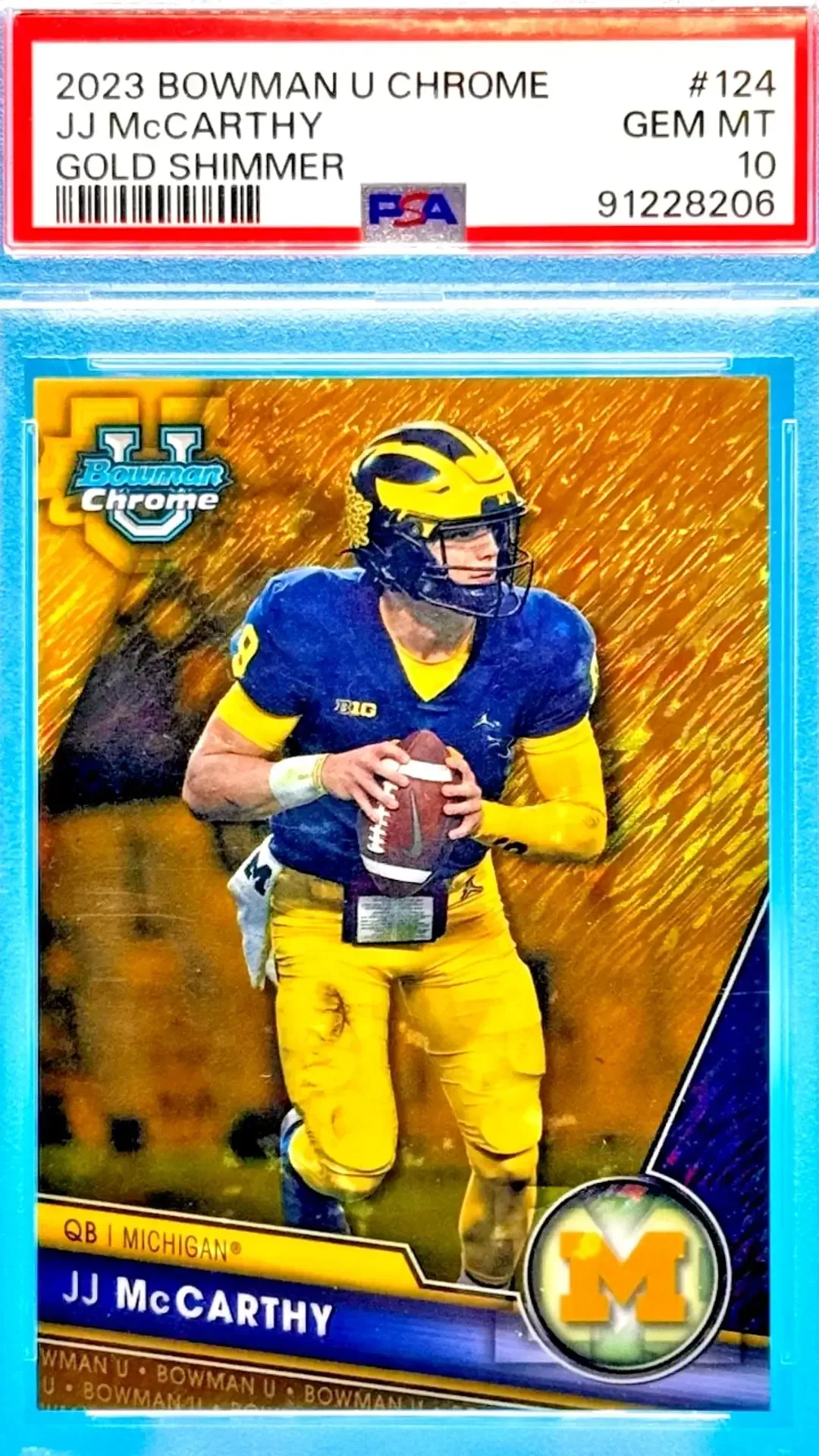 Image of JJ McCarthy from Michigan Wolverines in blue and yellow uniform for national champions on gold background.