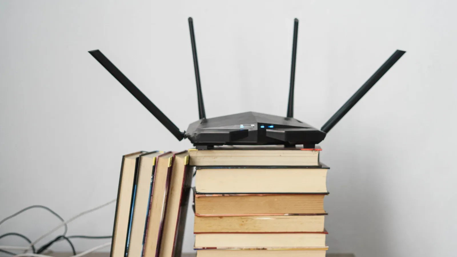 A home router connected to a game console and other devices, illustrating IPv6 networking