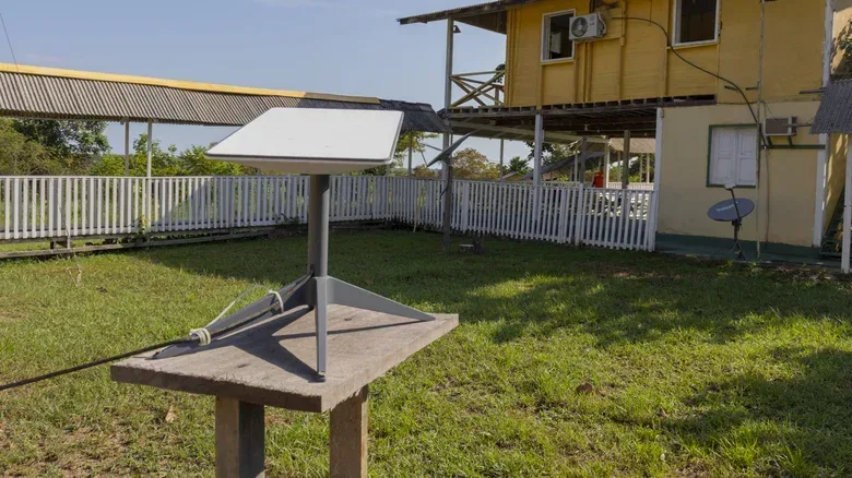 5G home internet router near a window