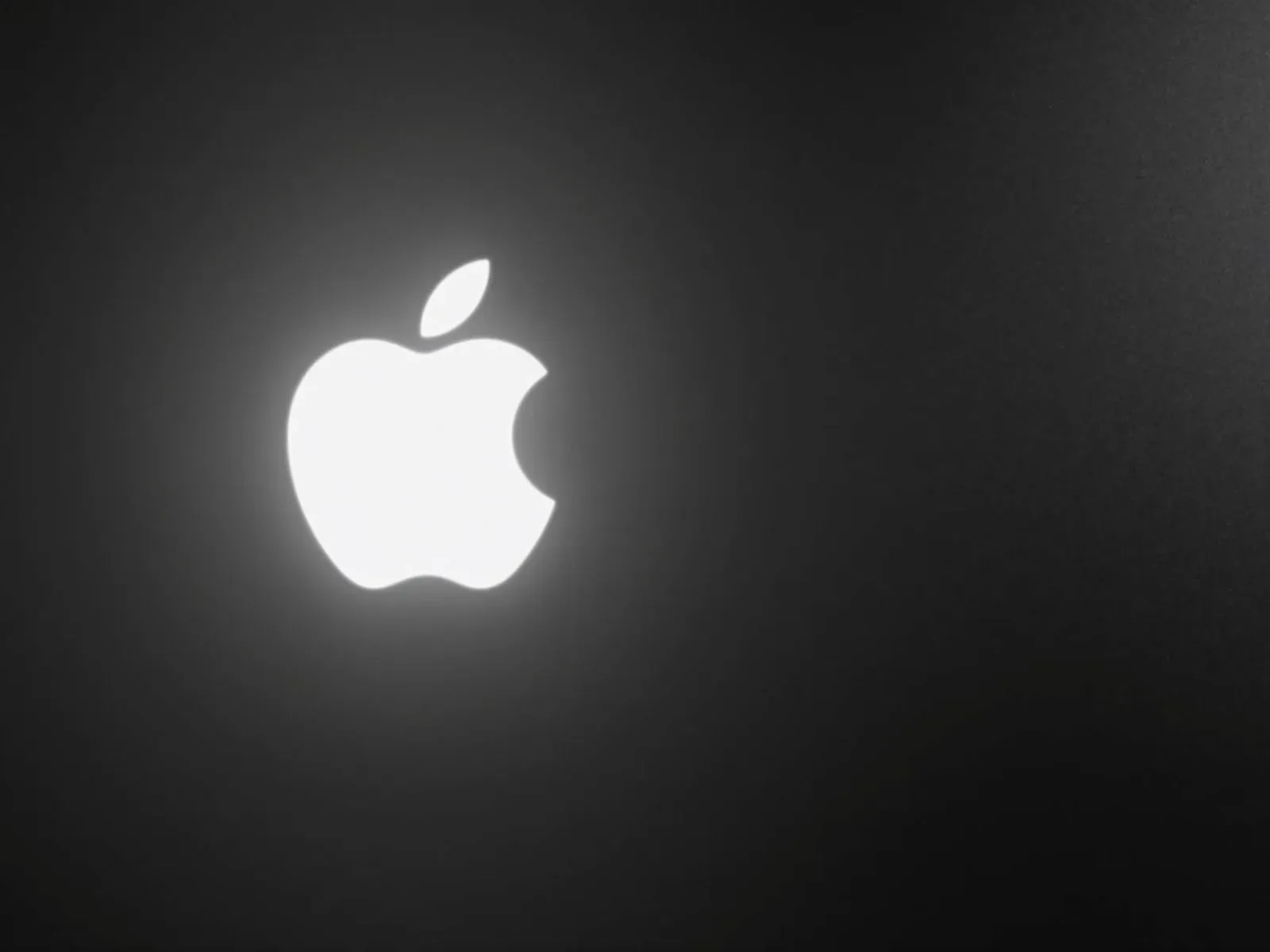 The Glowing Apple Logo Is Returning to MacBook Pro, but OLED Changes How It Can Work