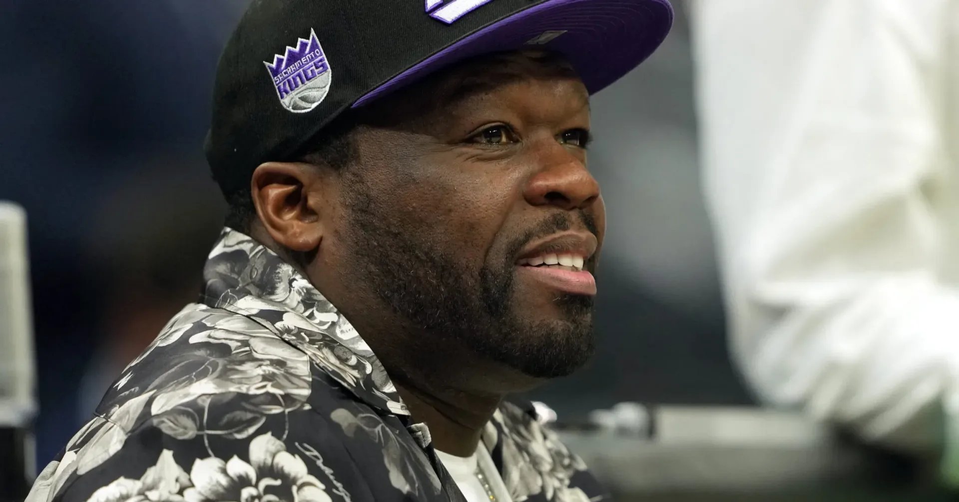 50 Cent performing onstage during a live show