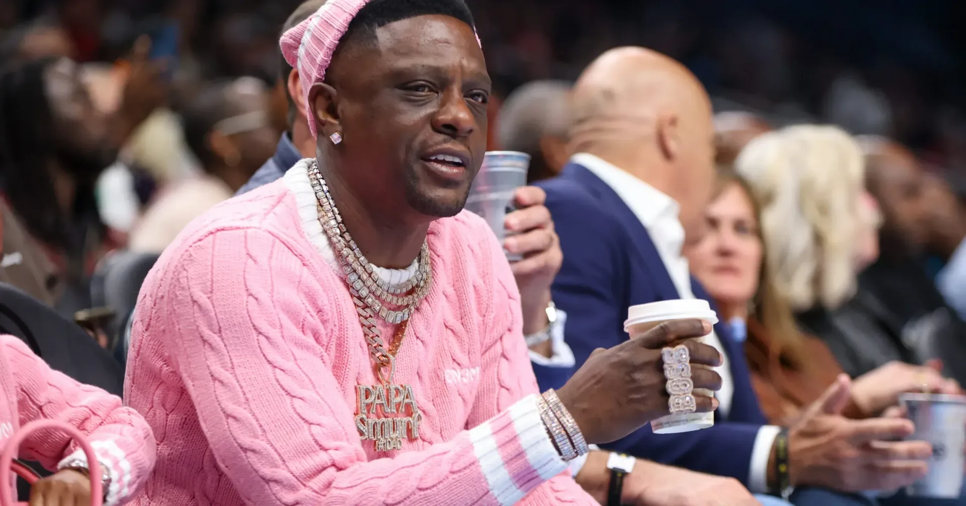 DJ Vlad wearing an eye patch while discussing a satirical story involving Boosie Badazz, N.O.R.E. and Aries Spears