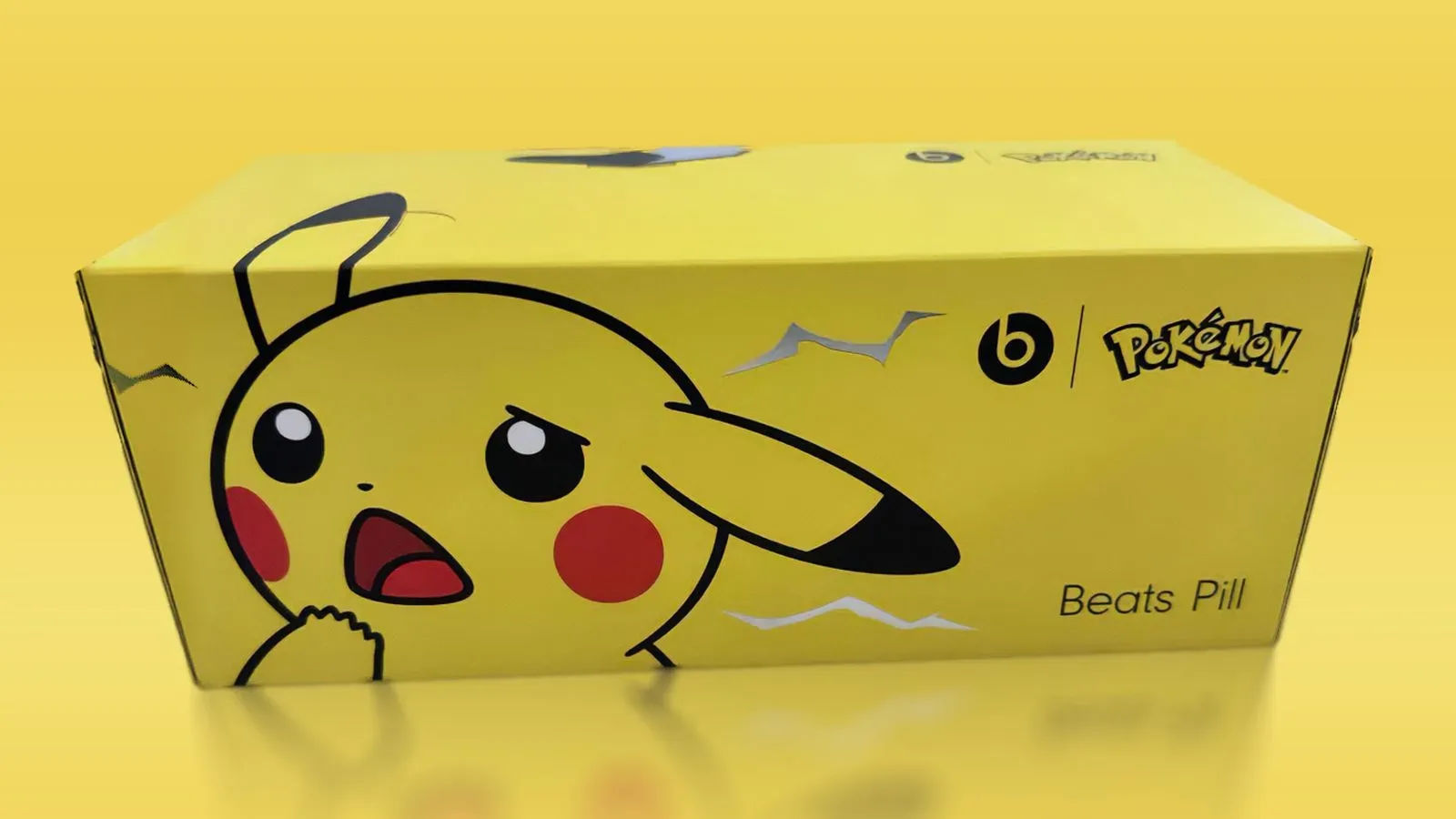 Beats Pill speaker shown with Beats and Poké Ball icons in Pokémon collaboration teaser