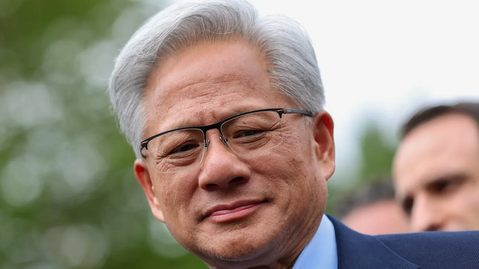 Jensen Huang at an AI industry gathering near Alice Huang in a 2024 social-media image