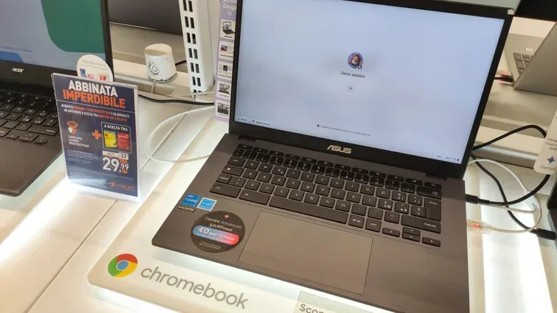 Laptop screen displaying Android app icons alongside a ChromeOS browser workspace