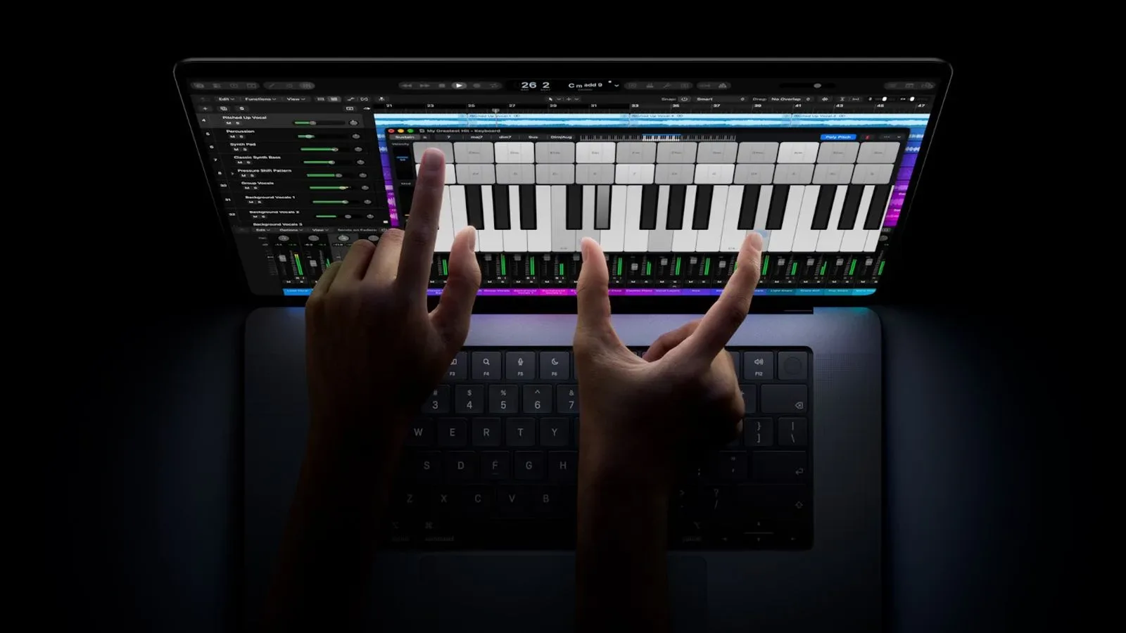 OLED MacBook Pro display showing macOS interface controls