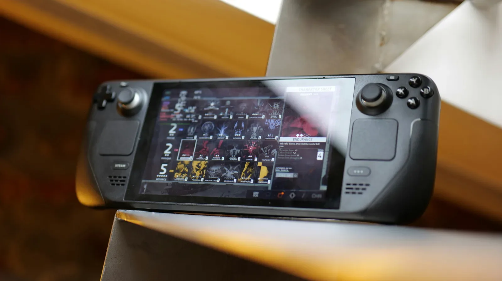 Original Steam Deck LCD handheld displaying the Steam library interface