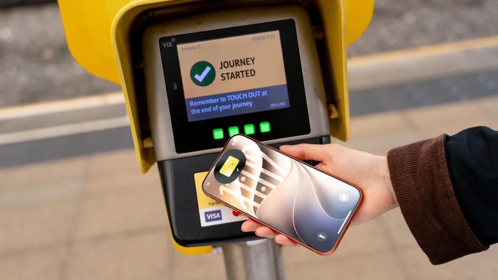 An iPhone showing a virtual Bee Card in Apple Wallet